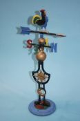 A decorative cast iron weather vane