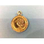 A 9ct gold medal, decorated with a liver bird and 'Liverpool Championship Club', engraved 'Won' by