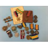 A collection of various World War I and World War II medals to various recipients, a soldiers pay