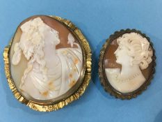 Two oval cameo brooches