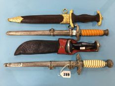 Three replica German daggers and one other