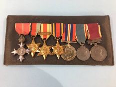 A group of medals to SJT R.W. White IACC, including Long and Gold service medal, OBE Africa Star,