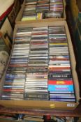 Two boxes of music CDs, Buddy Holly etc.