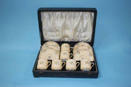 A cased set of six Spode china 'Old Concord' pattern coffee cups and saucers