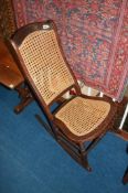 Cane work rocking chair