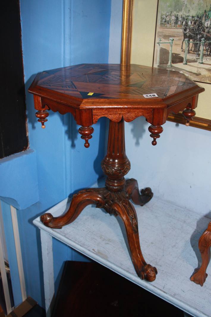A late 19th century octagonal tripod table with parquetry top