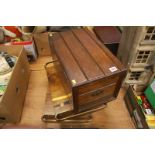 A wooden chest and a pair of wooden bread blocks