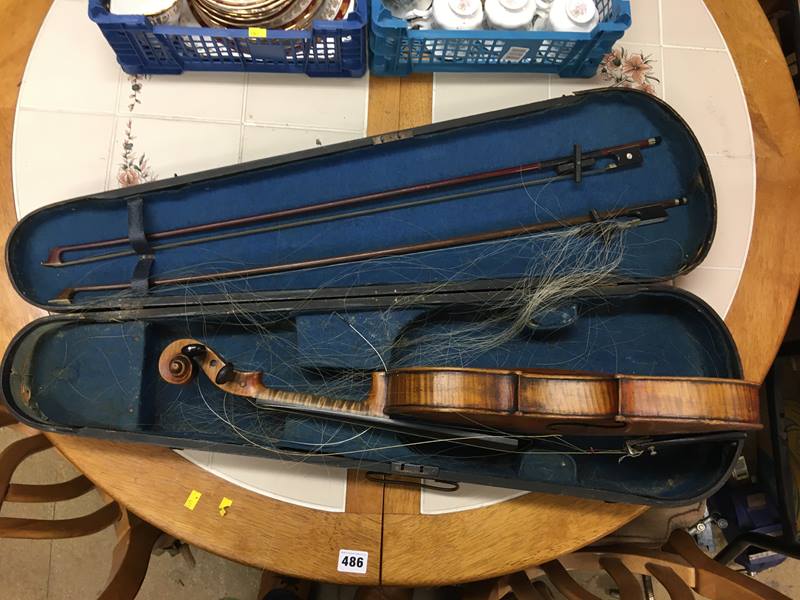 A violin in a case - Image 9 of 16