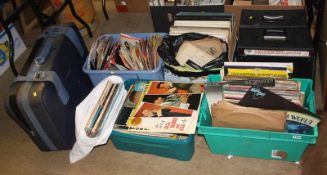 A large quantity of vinyl records, singles, Billy Joel etc.