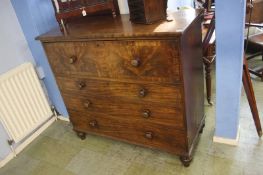 A 19th century mahogany straight front chest of drawers with four long drawers, supported on