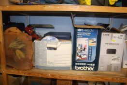 A shelf of miscellaneous, printers and sheet music etc.