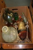 A box of miscellaneous, candlestick holders etc.