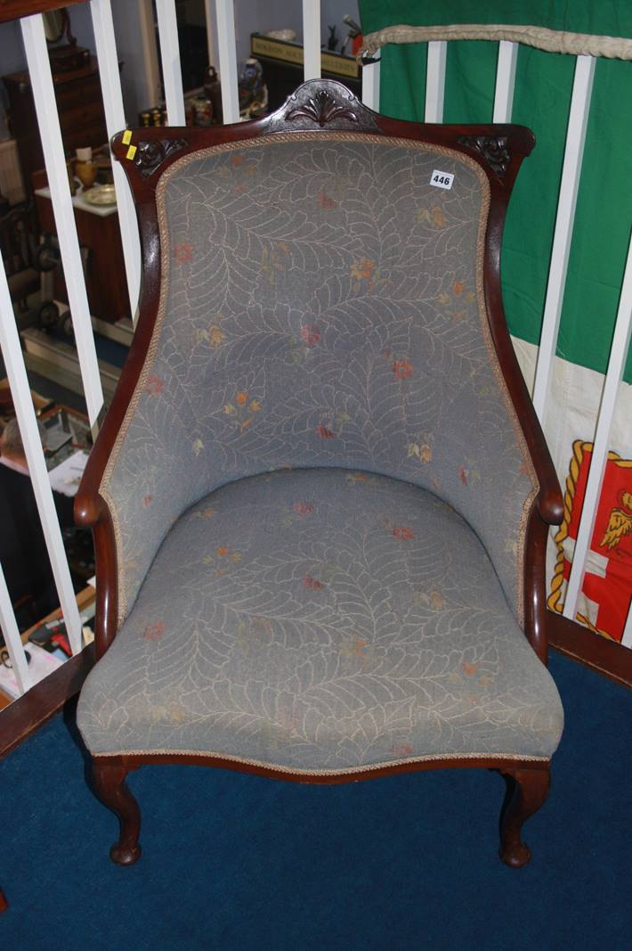 An Edwardian mahogany framed armchair