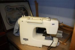 A Brother electric sewing machine etc.