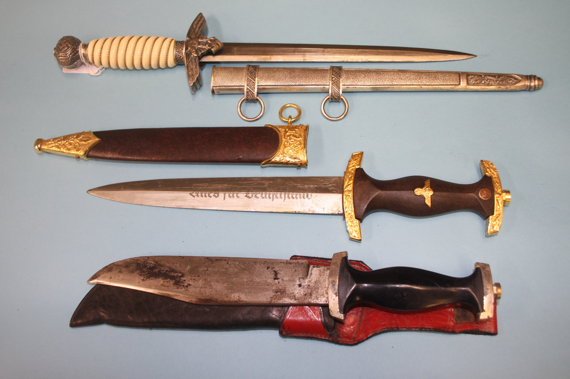 Two German style daggers and one other