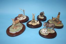 A collection of six Border Fine Arts figures