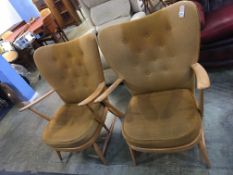 Pair of early Ercol armchairs