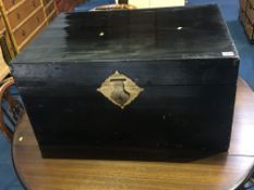 A black lacquered Oriental chest