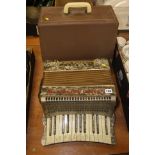 An accordion and a sewing machine