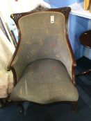 An Edwardian mahogany armchair