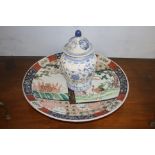 Large Imari wall plaque and a blue and white vase