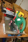 Tile cutter, hedge trimmer and a circular saw