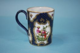 A Continental porcelain coffee can, decorated with exotic birds