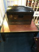 Coffee table and a dome top trunk