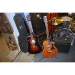 A Sigma acoustic guitar and case, a Tanglewood and case and an amp