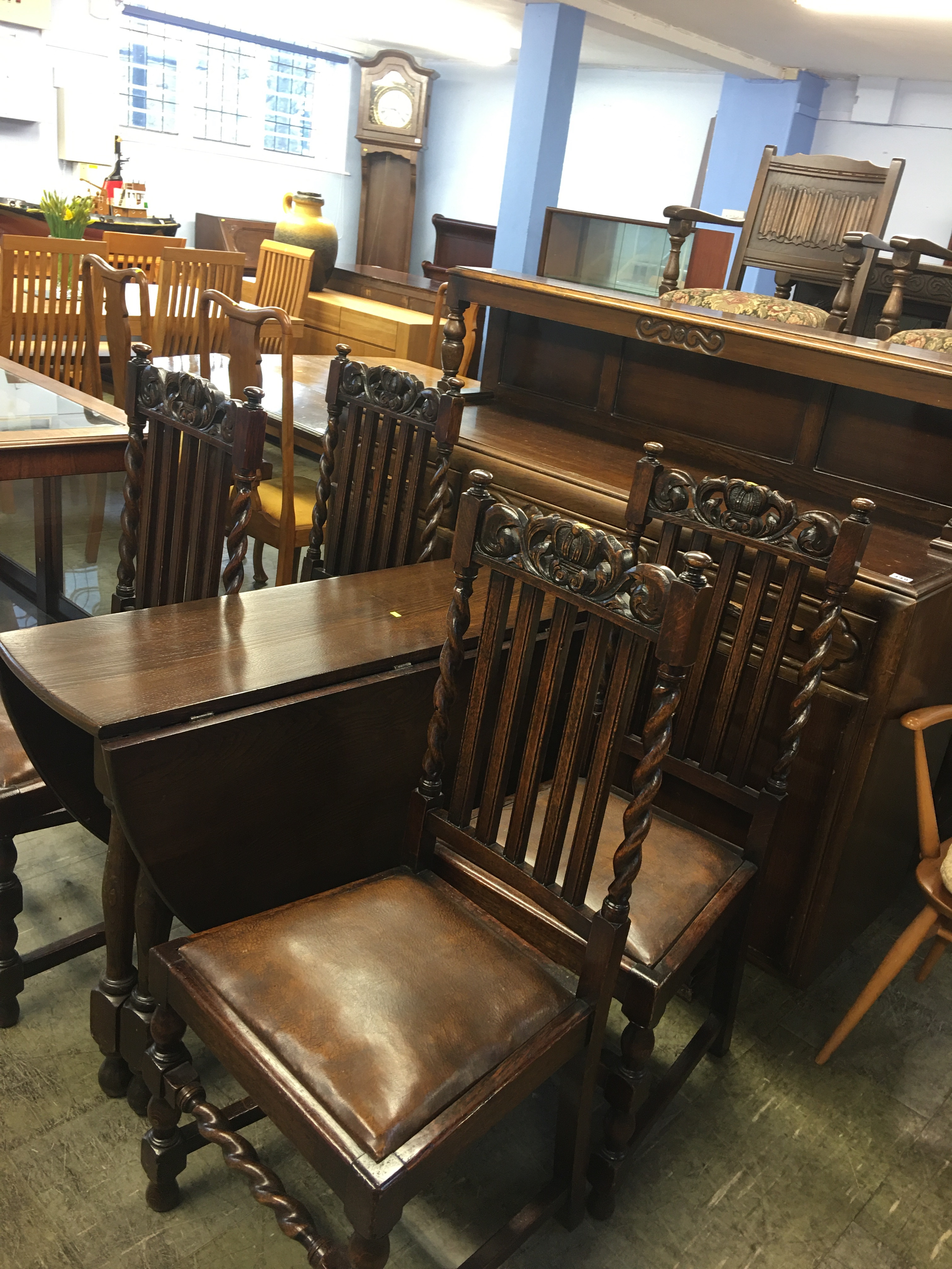 Oak sideboard, gateleg table and a set of four oak barley twist chairs