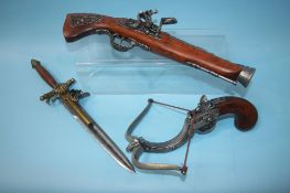 Three replica weapons