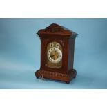 Oak bracket clock with strike action, eight day movement