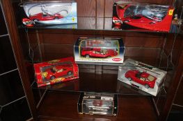 Six boxed models of Ferrari cars