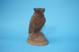 A carved wood owl inkwell