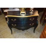 A French style blue and gold painted two drawer commode