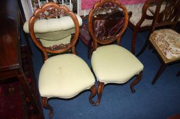 Pair of walnut single chairs