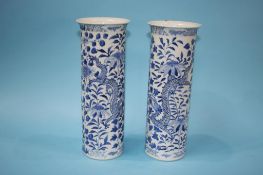 A pair of Chinese blue and white spill vases, decorated with serpents, marks in underglaze blue,