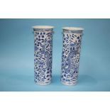 A pair of Chinese blue and white spill vases, decorated with serpents, marks in underglaze blue,