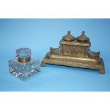 A brass inkwell and a glass inkwell (2)
