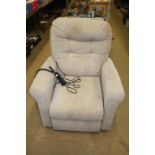 Beige recliner armchair