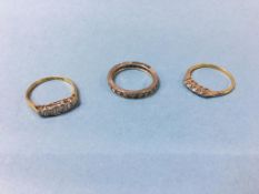 Two 18ct gold and diamond rings and an 18ct white gold diamond eternity ring, total weight 7.6 gram