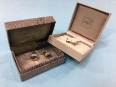 A modern Lalique ‘Oceania’ brooch and a pair of Lalique cuff links (boxed)