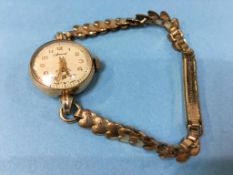 A ladies Accurist wristwatch, in 9ct gold case