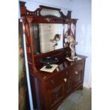 An Edwardian mirror back sideboard