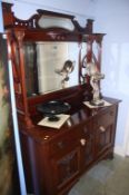 An Edwardian mirror back sideboard