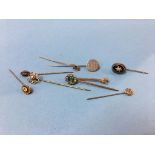 Collection of various pins, 15ct pin mounted with single diamond etc.