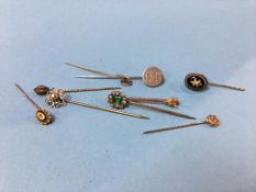 Collection of various pins, 15ct pin mounted with single diamond etc.