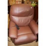 A brown rise and recliner armchair