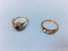 Two 18ct gold and diamond mounted rings, 5.5g