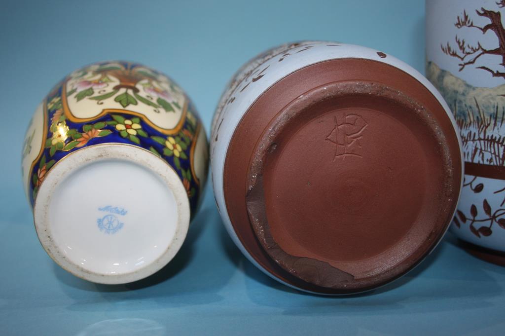 A decorative pair of Noritake vases, 24cm height and a pair of earthenware vases on a pale blue - Image 2 of 2